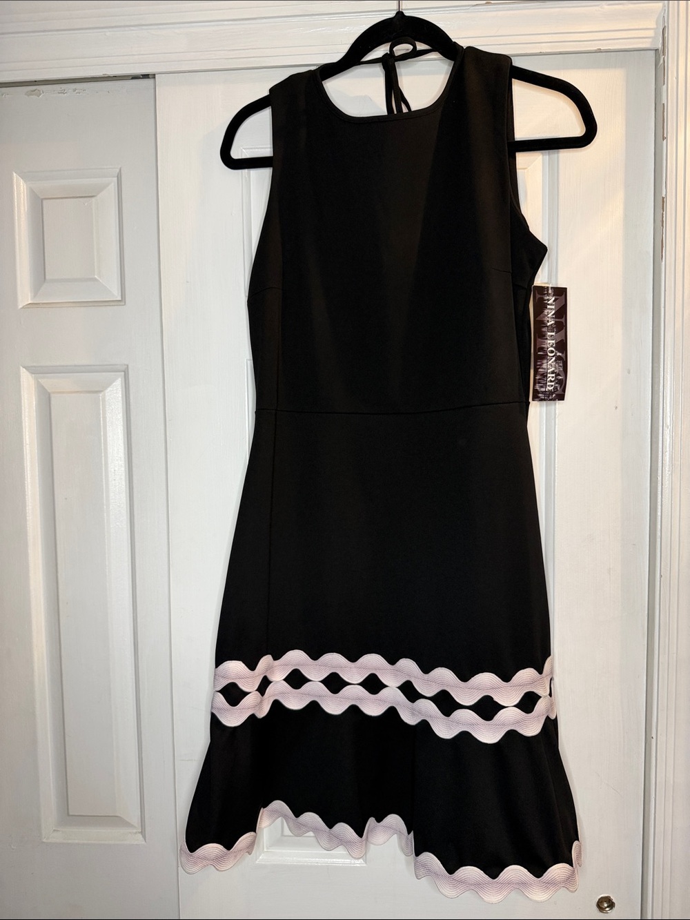 Nina Leonard Sleeveless Black Dress with White Wave Trim